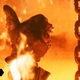 The black-gloved hand of the "good" T-800 giving a thumbs-up as it slowly descends to its doom in molten steel.